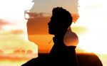 A silhouette of a young man's head against a sunset
